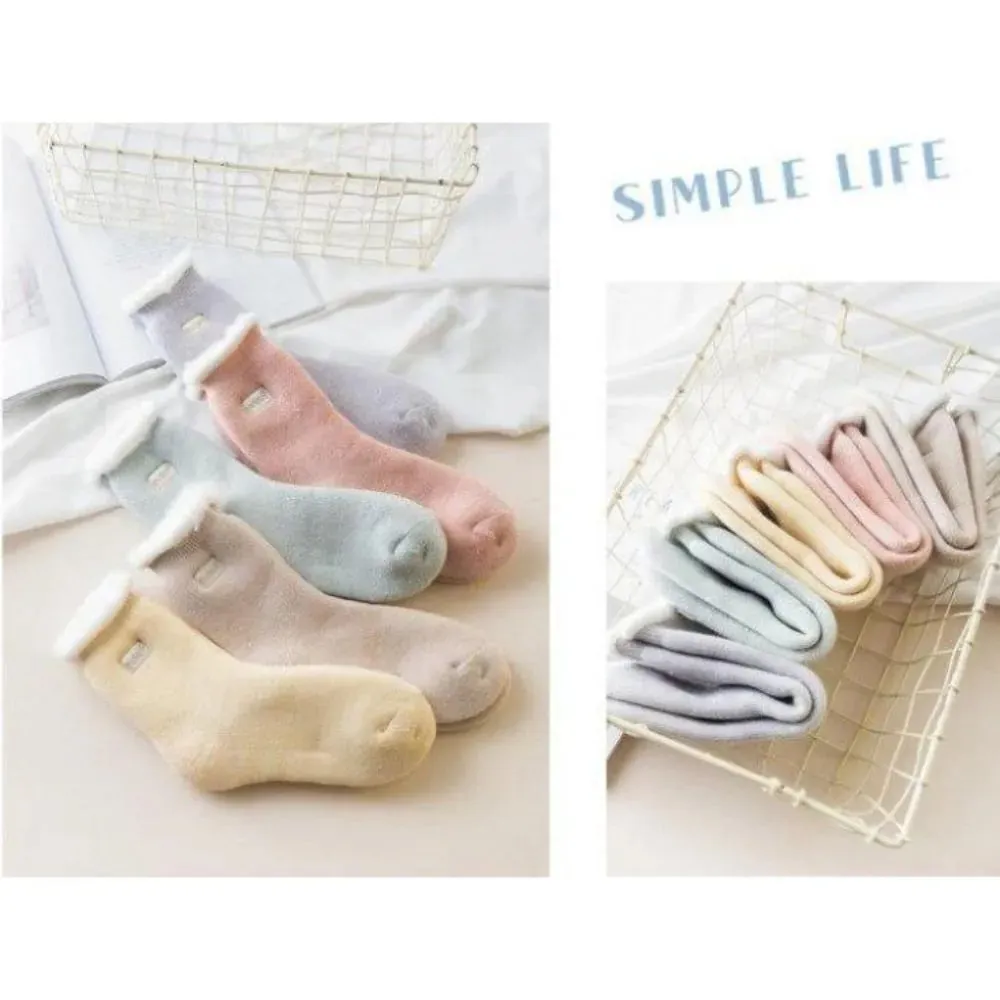 Fluffy Top Thick Tube Socks: Cute socks with an embroidered badge, ideal for colder days